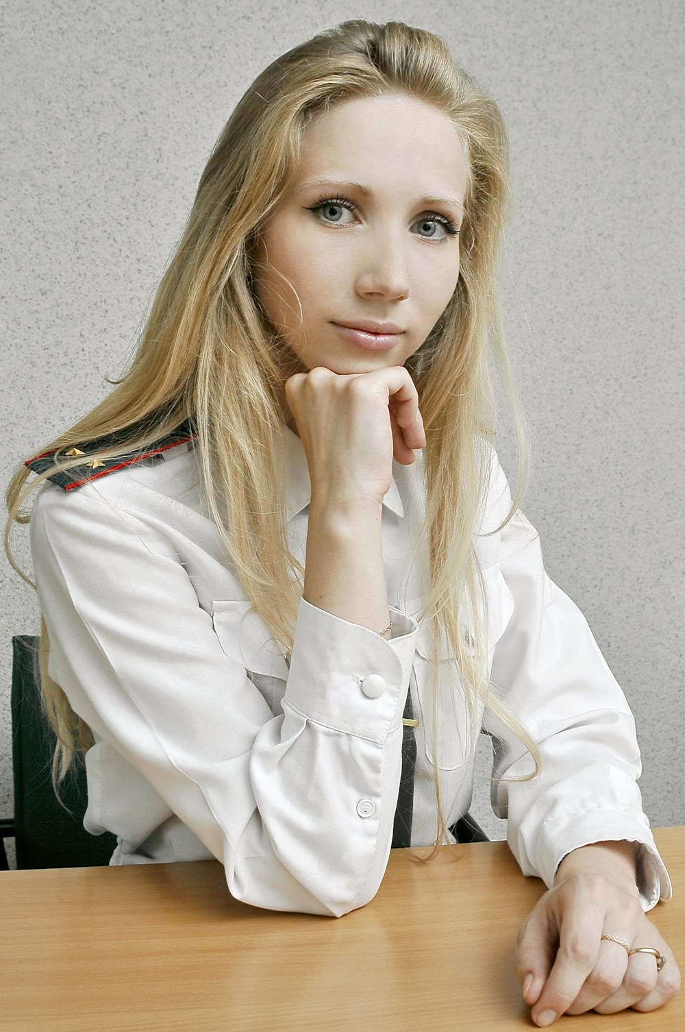 woman in white button up long sleeve shirt