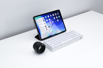 black ipad with white keyboard