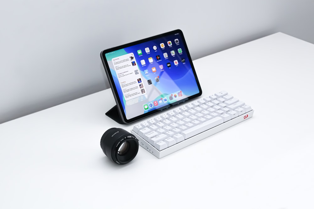 black ipad with white keyboard