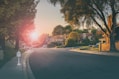 cars parked on side of the road during daytime