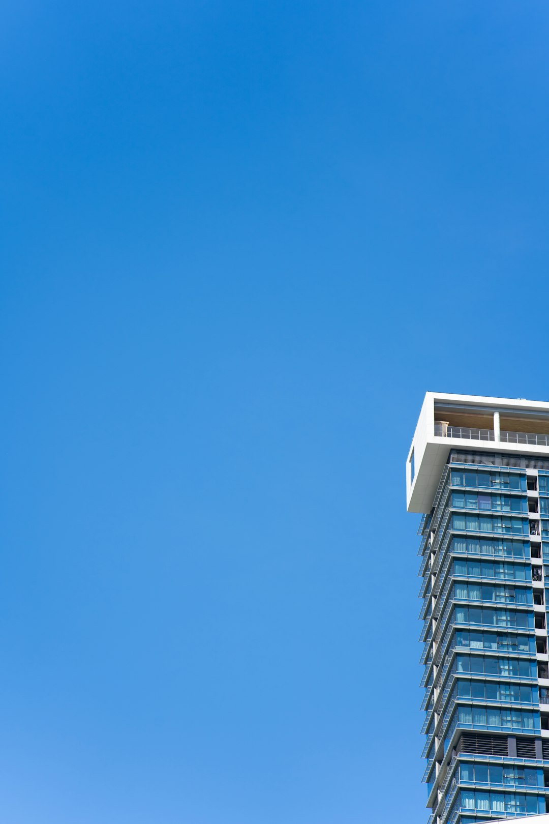 white concrete building under blue sky during daytime