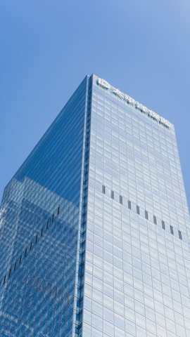 white and blue concrete building under blue sky during daytime