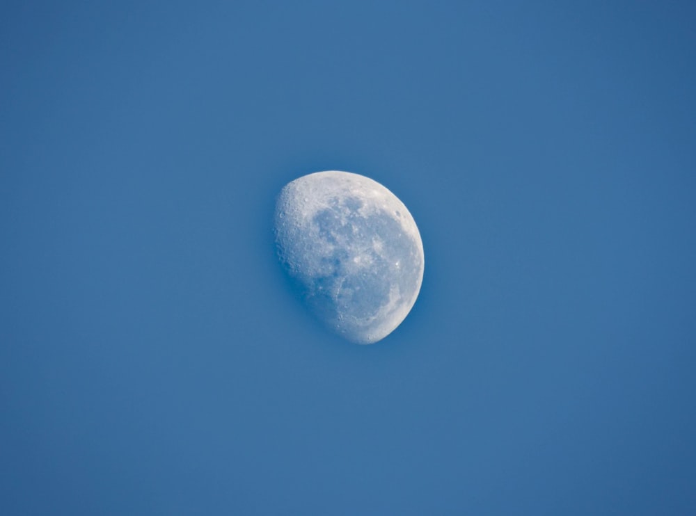 full moon in blue sky