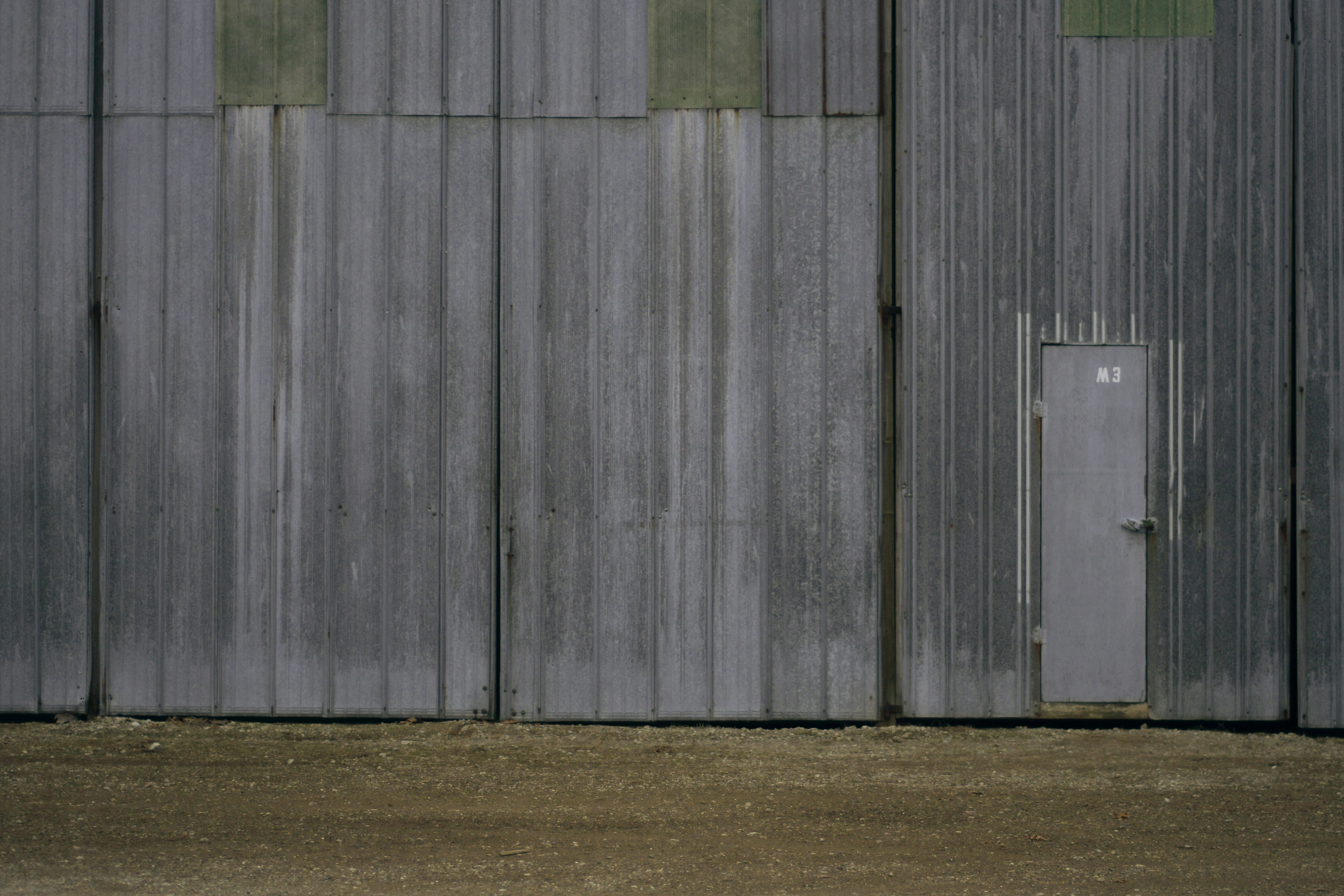 gray and green concrete wall