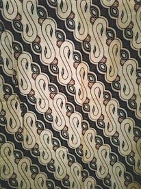 white black and brown textile