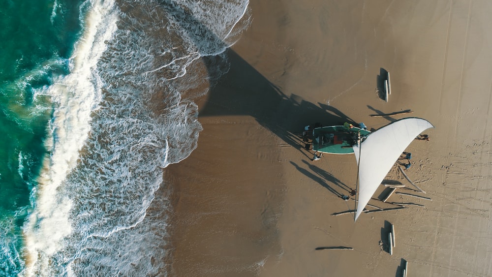 red and white boat on body of water during daytime