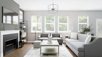 Elegant gray and white luxury senior home with a cozy backyard and large screen TV by the fireplace.