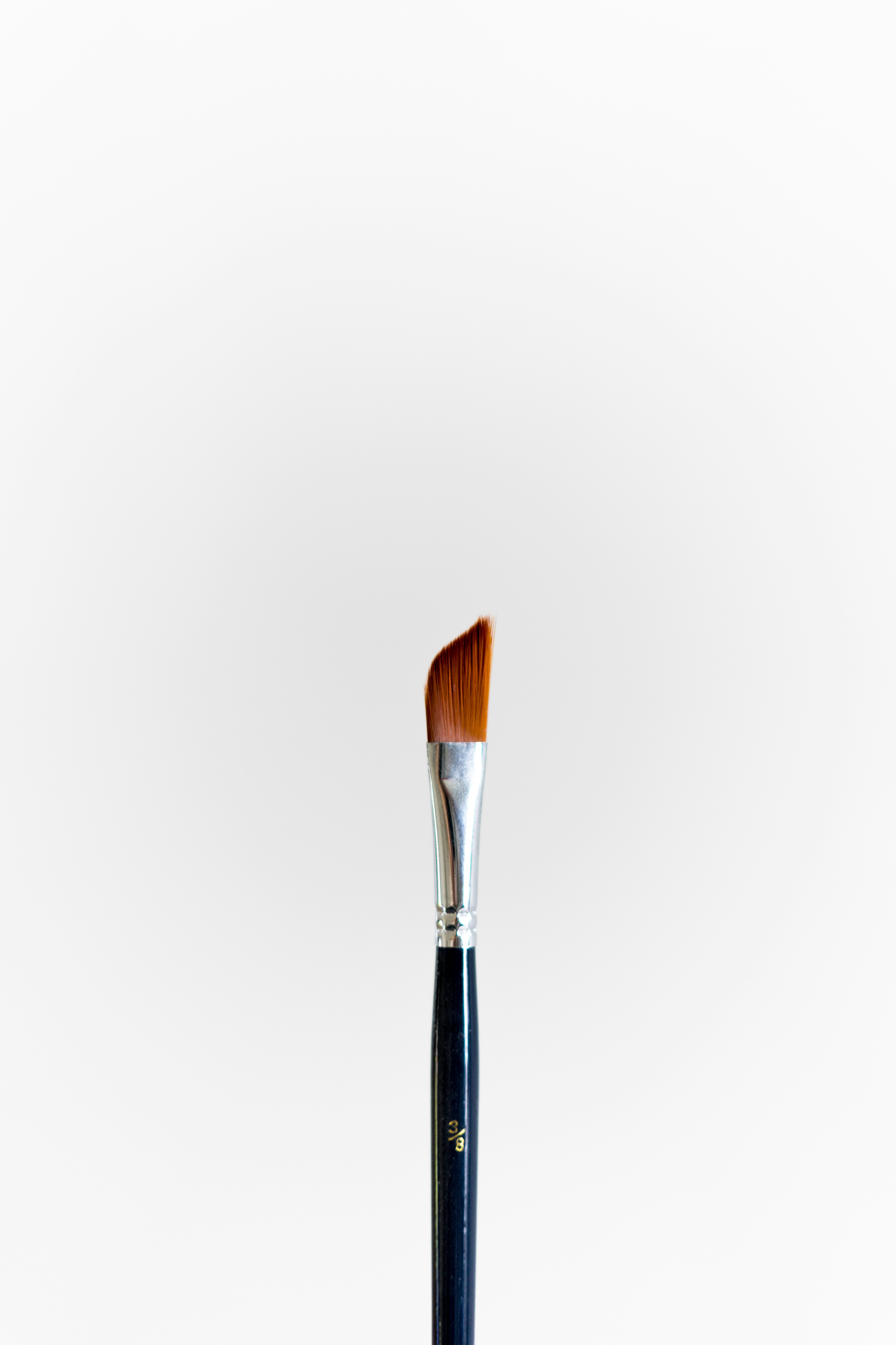 black and brown makeup brush