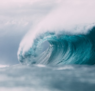 white and blue ocean waves