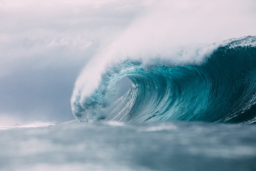 white and blue ocean waves,