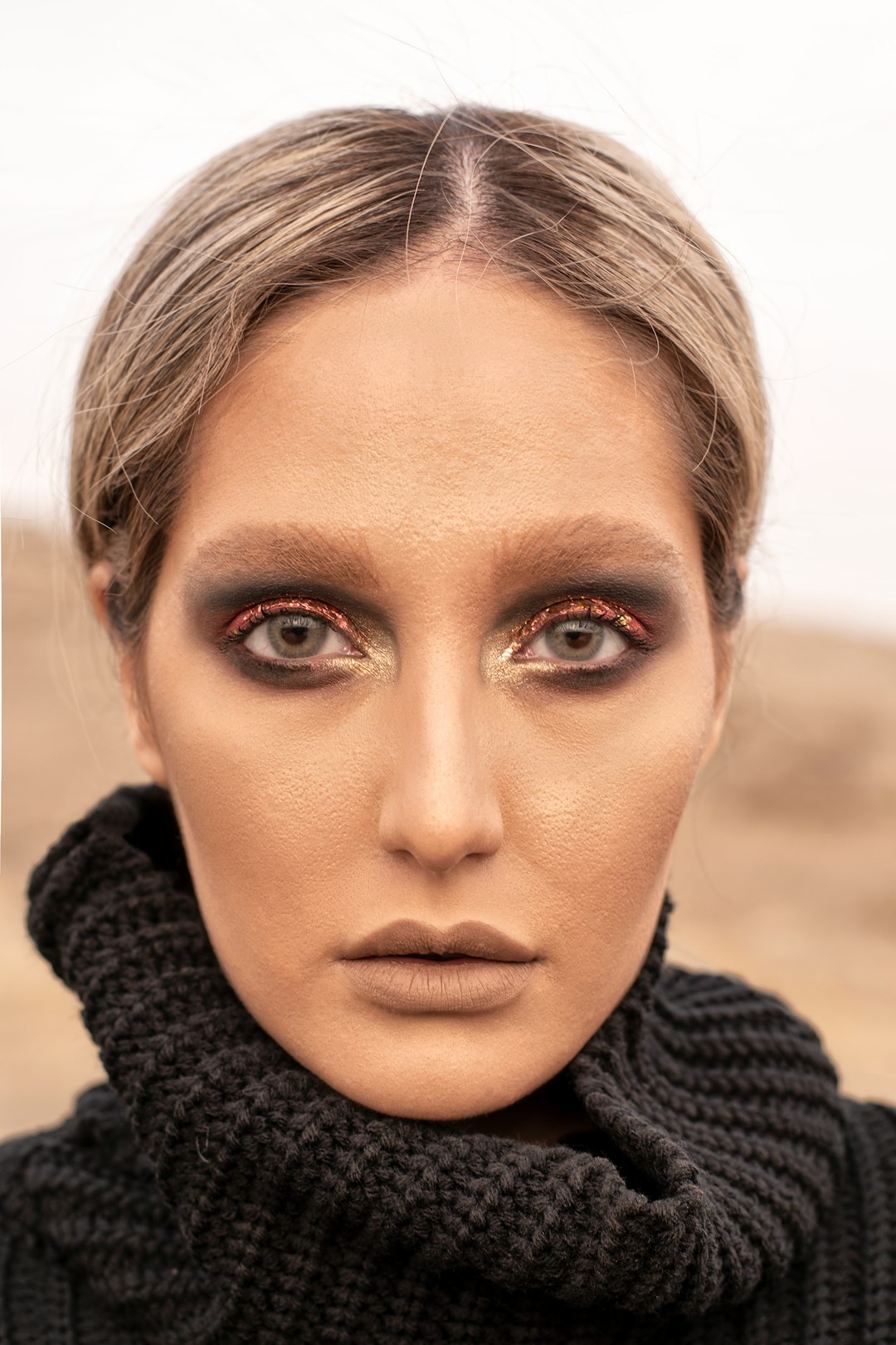 woman in black and white knit turtle neck shirt