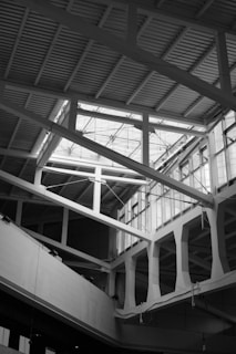 Interior view of a renovated industrial space with exposed beams.