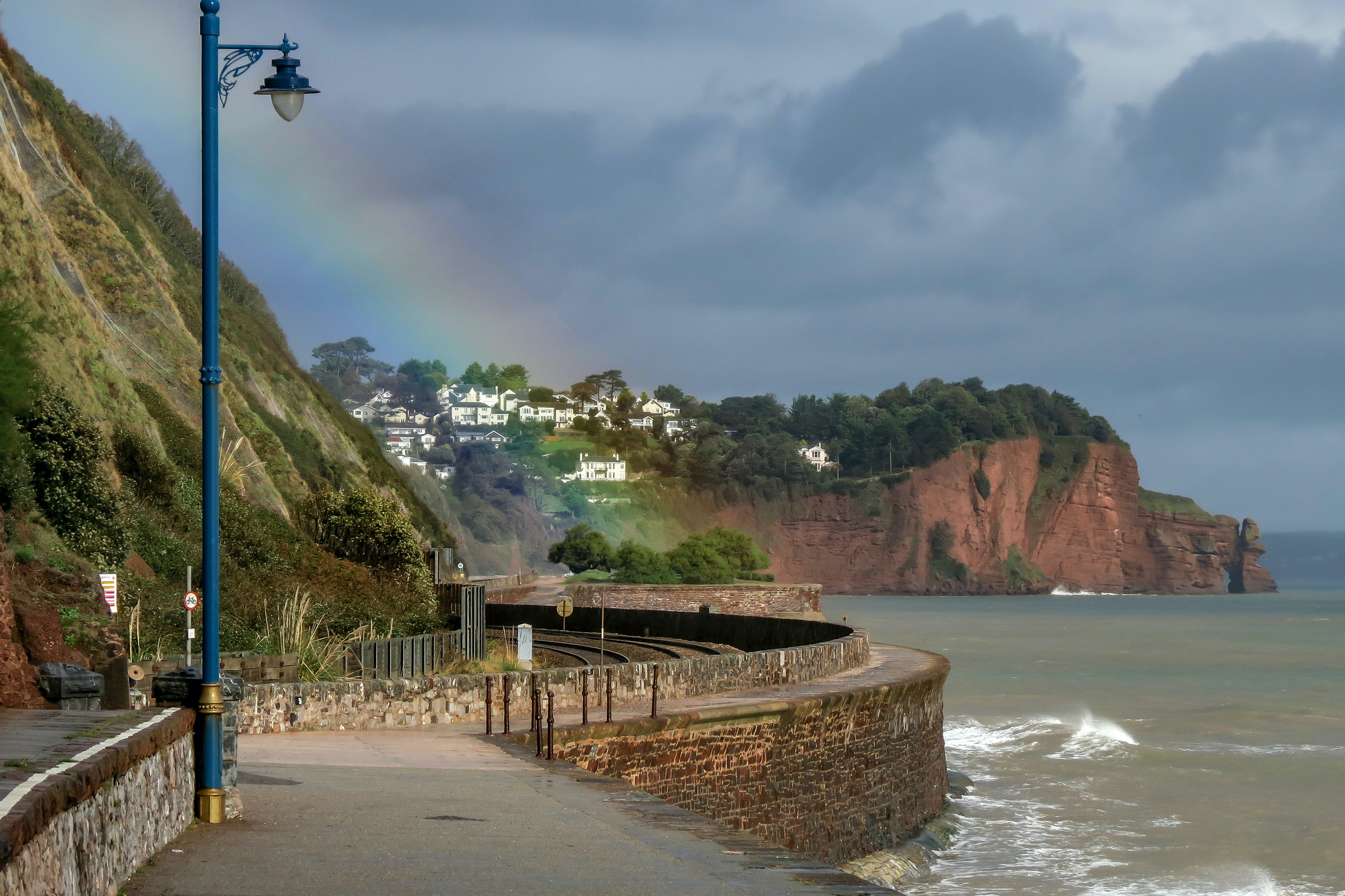 people walking on beach shore during daytime