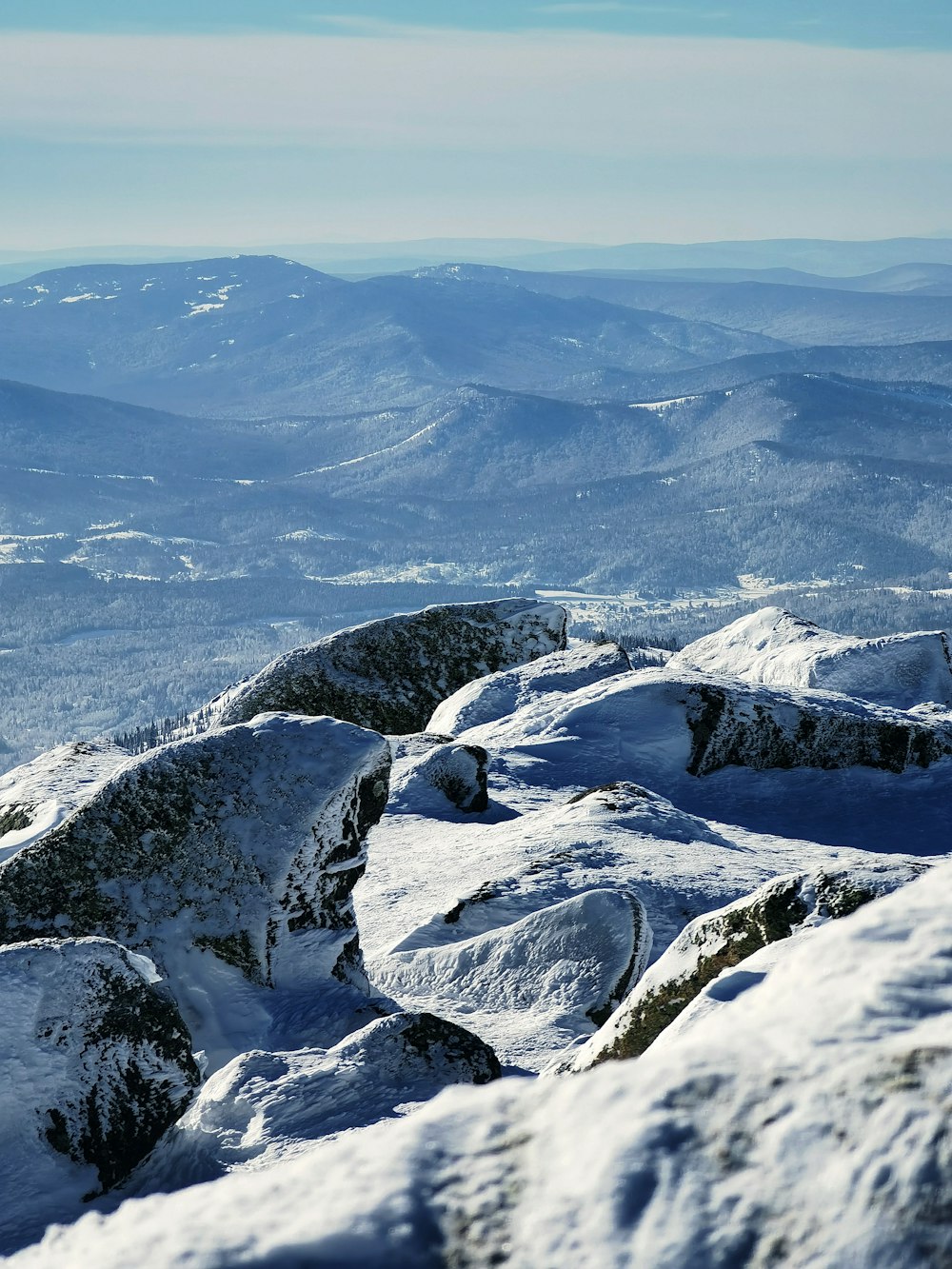 snow covered mountain during daytime