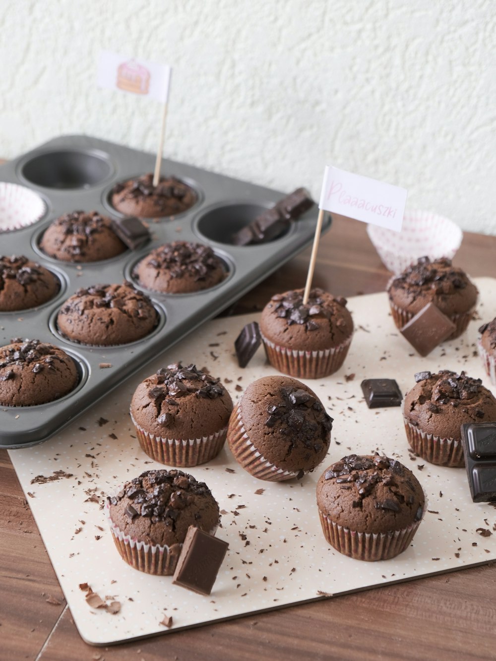 cupcakes on brown wooden tray