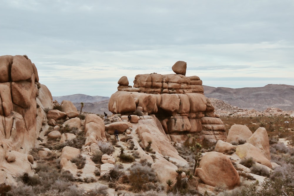 brown rock formation under blue sky during daytime