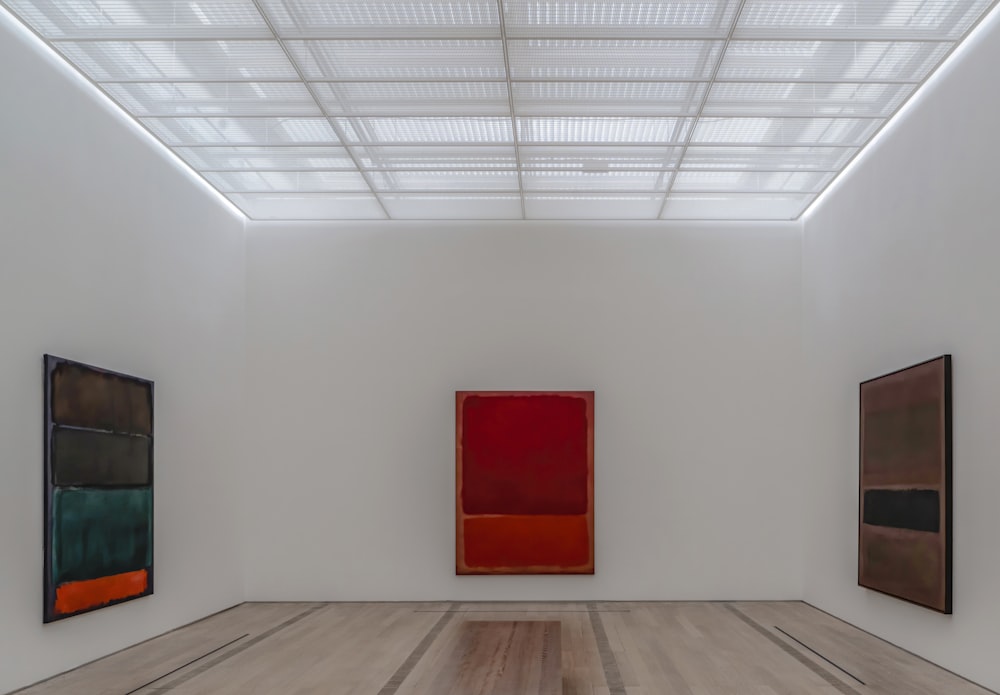 red wooden door on white wall