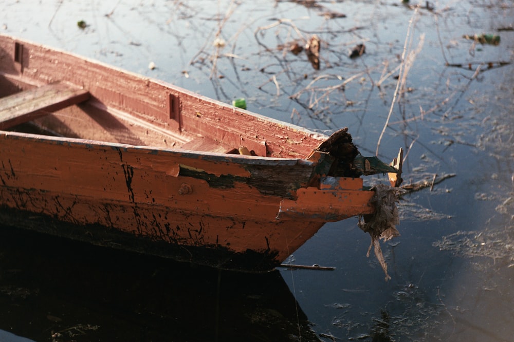 brown boat on body of water during daytime