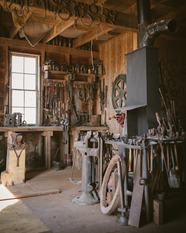 brown wooden cabinet near white and black sewing machine