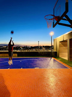 Action shot of a BlazeHoop player making a jump shot during a lively game at the Biggleswade court.