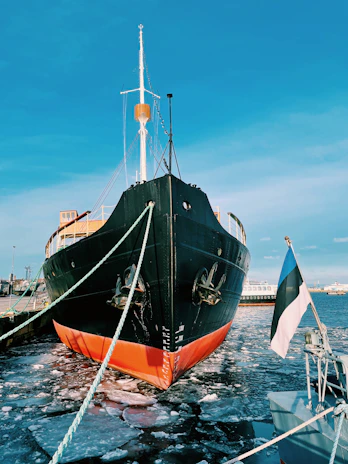black and brown ship on sea during daytime