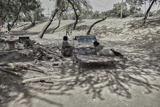 A candid photo of Eklavya rehearsing a dramatic scene outdoors.