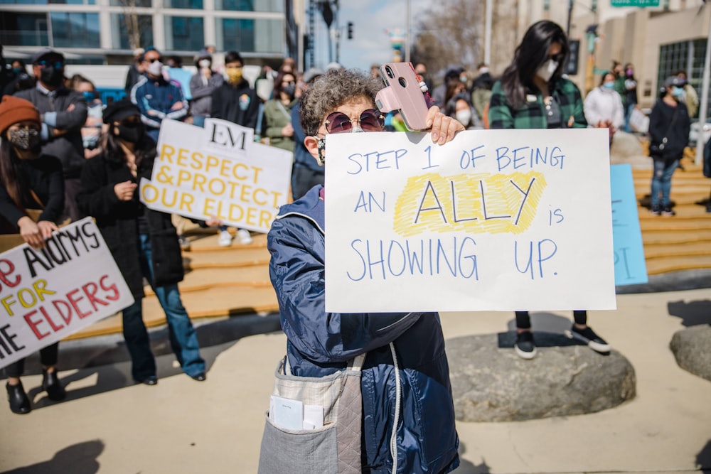 Protest Sign: The number one step of being an ally is showing up