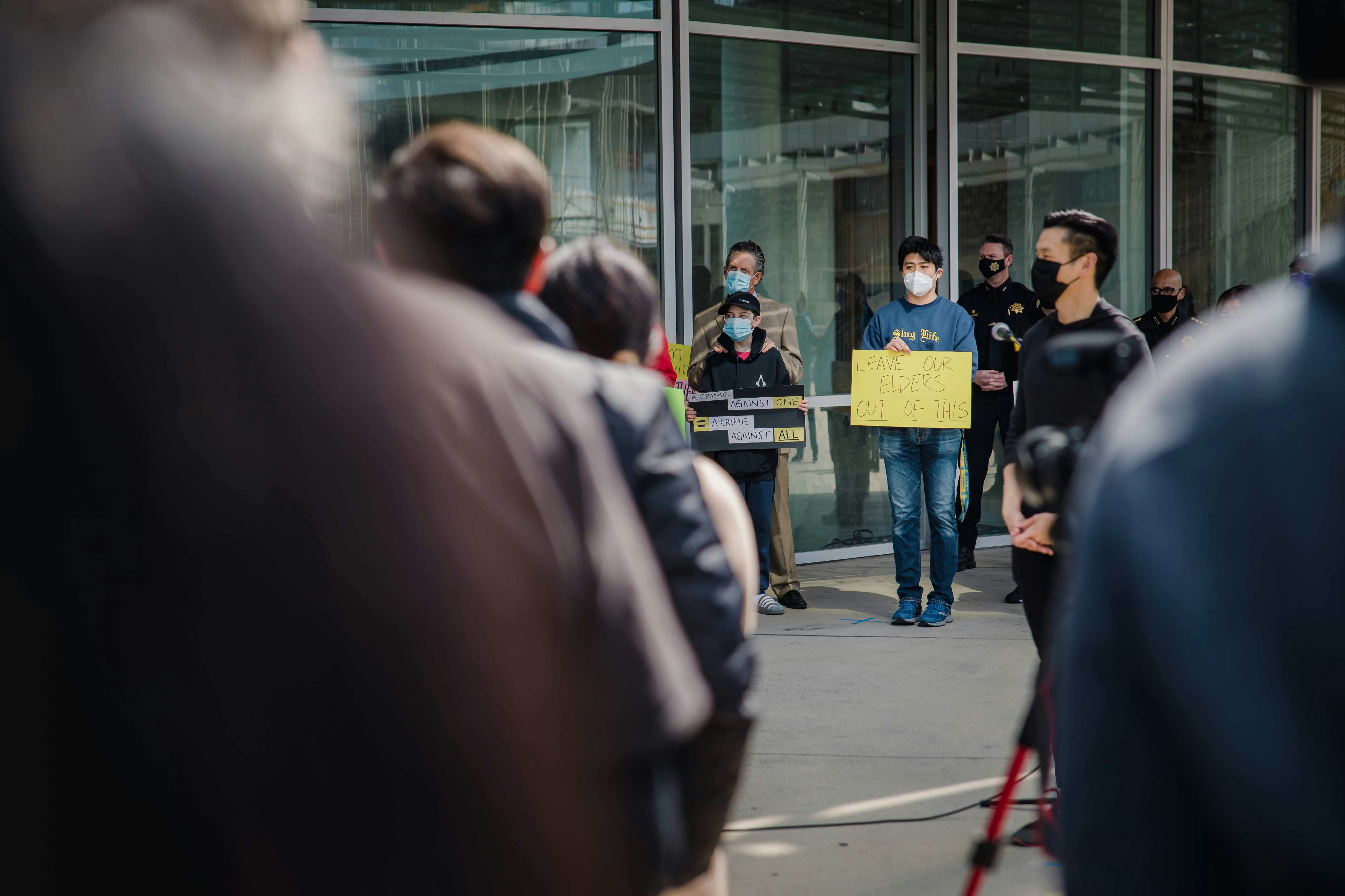 people walking on sidewalk during daytime