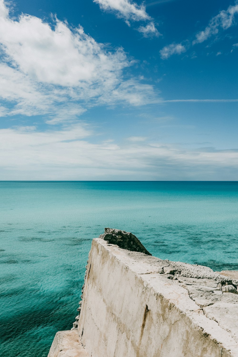 blue sea under blue sky during daytime