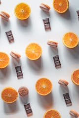 orange fruit beside black and silver flash drive