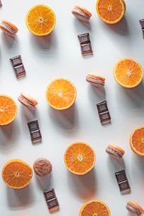 orange fruit beside black and silver flash drive