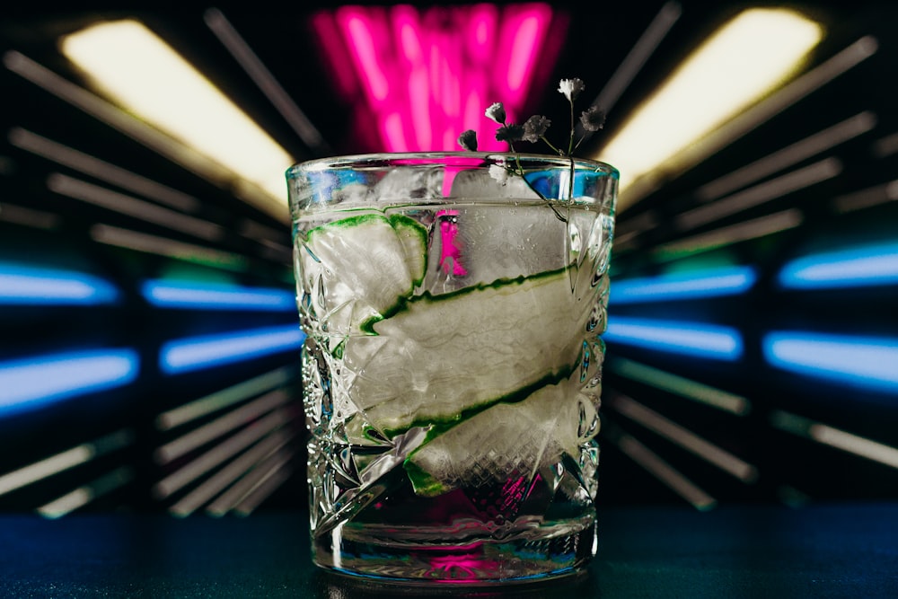 clear drinking glass with ice cubes and ice cubes