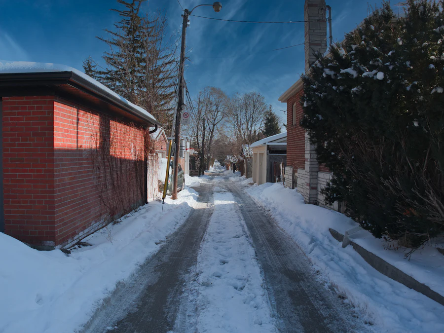 A residential street of rental homes after a snowfall