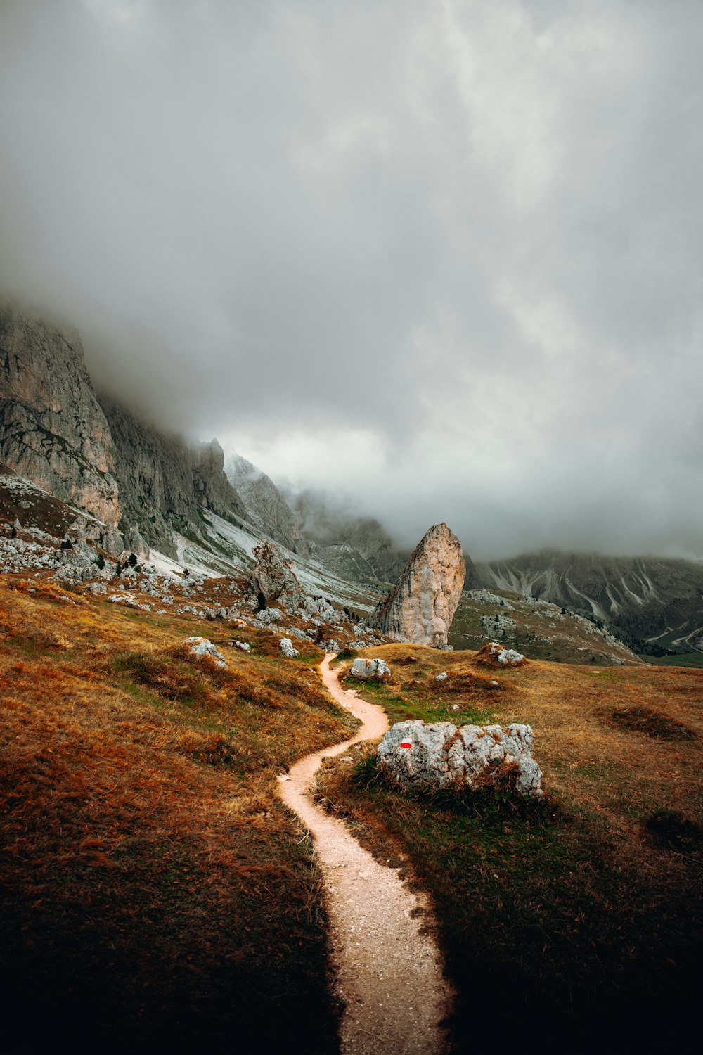 brown and gray rocky mountain under white sky during daytime