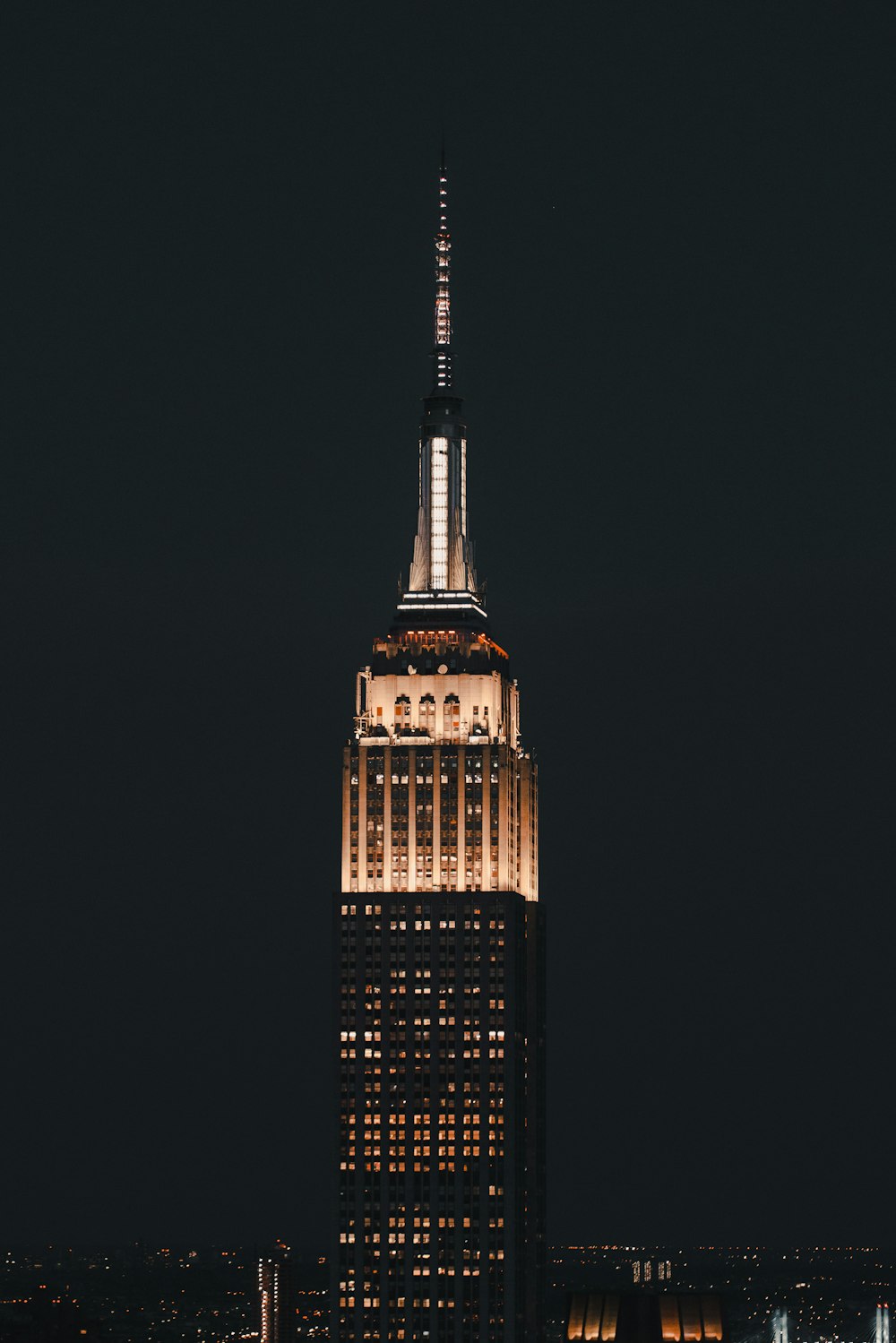 lighted high rise building during night time