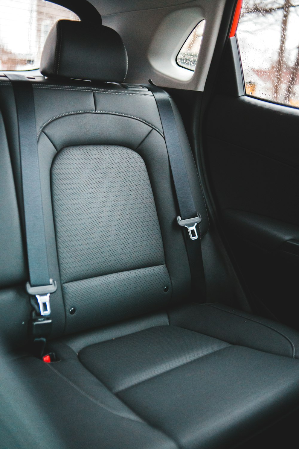 black leather car seat during daytime