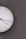 white analog wall clock at 11 00