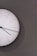 white analog wall clock at 11 00