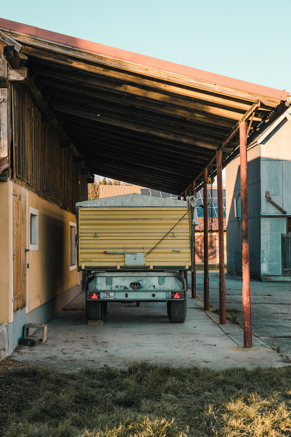 white and brown truck in garage