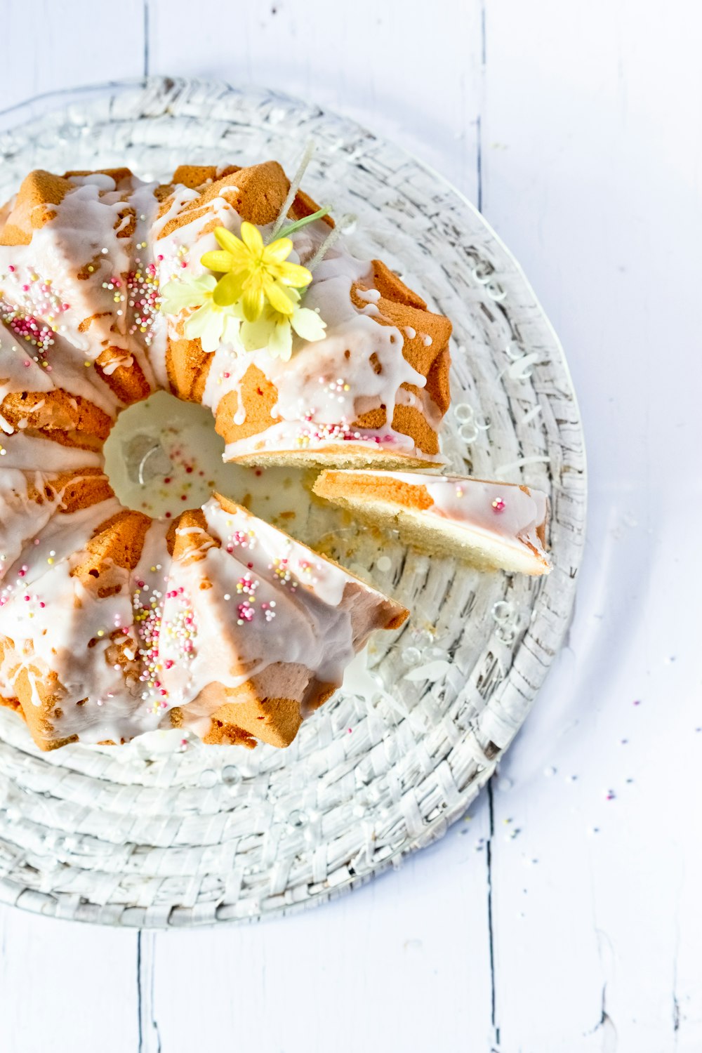 white and brown floral ceramic plate