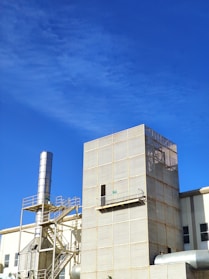 gray concrete building under blue sky during daytime