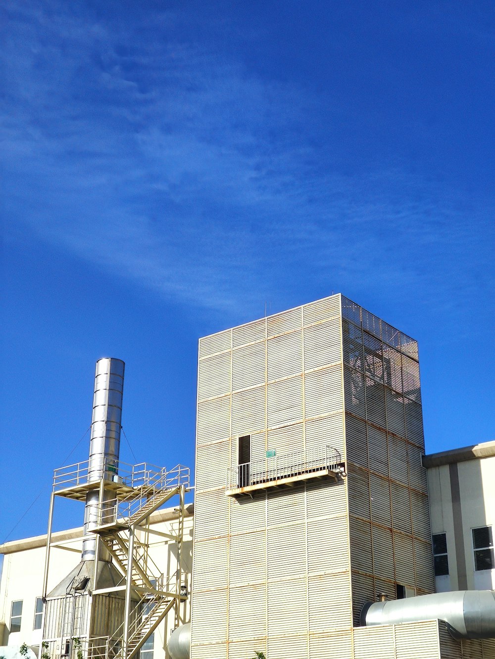 gray concrete building under blue sky during daytime