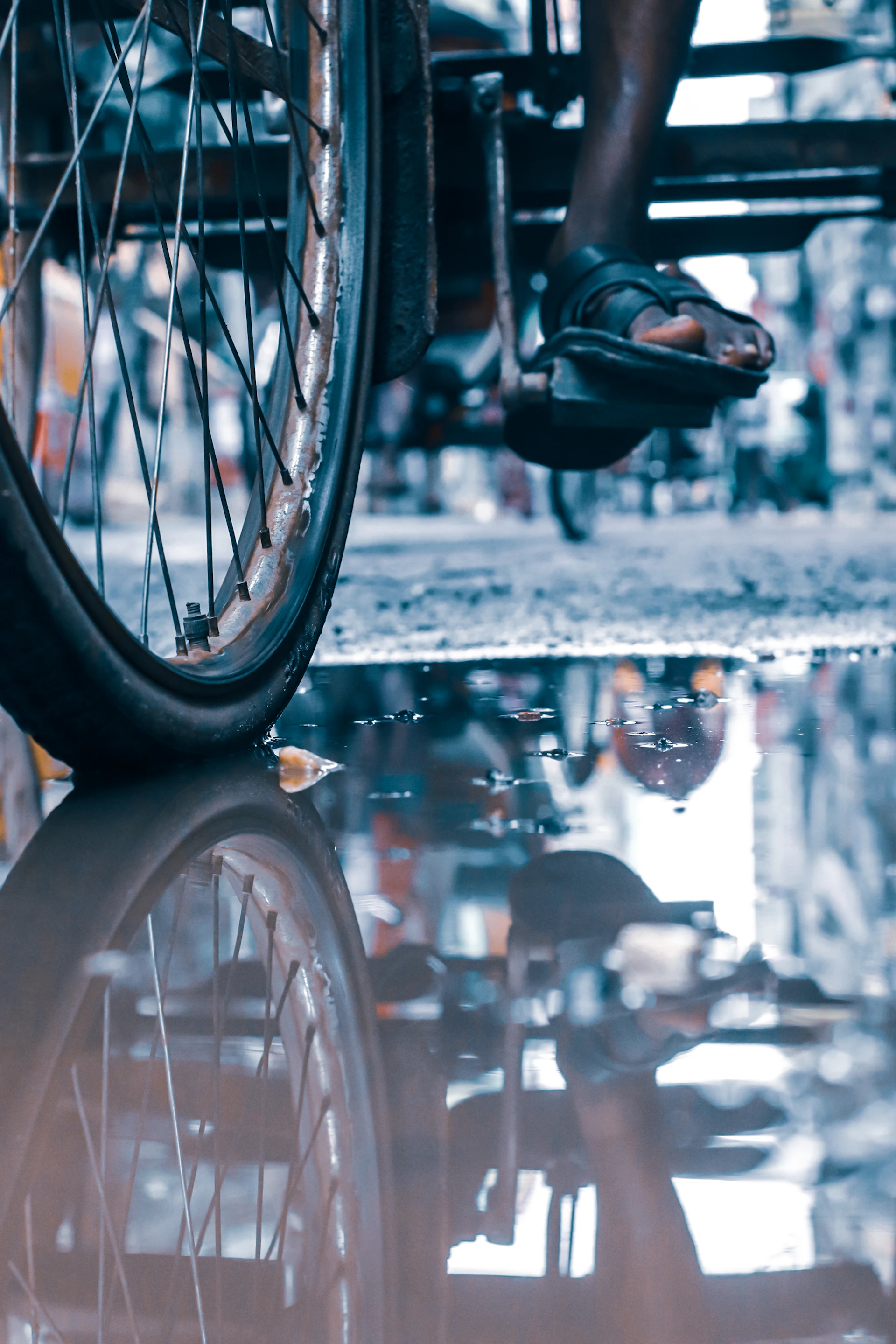 person riding bicycle on street during daytime