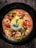 A vibrant dish prepared from Hoodhanna's recipes, showcasing gourmet presentation.