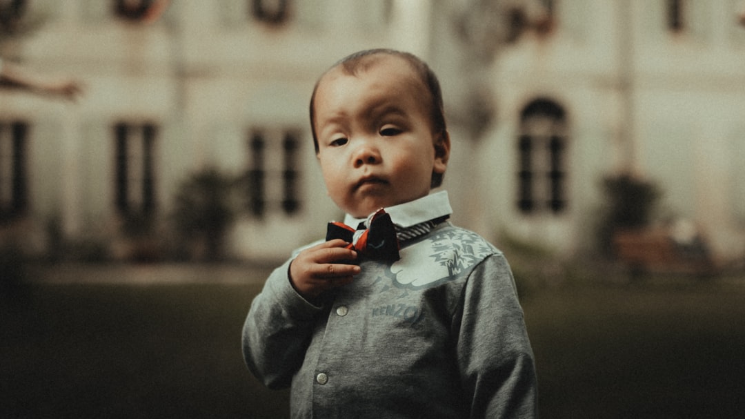 boy in black button up long sleeve shirt