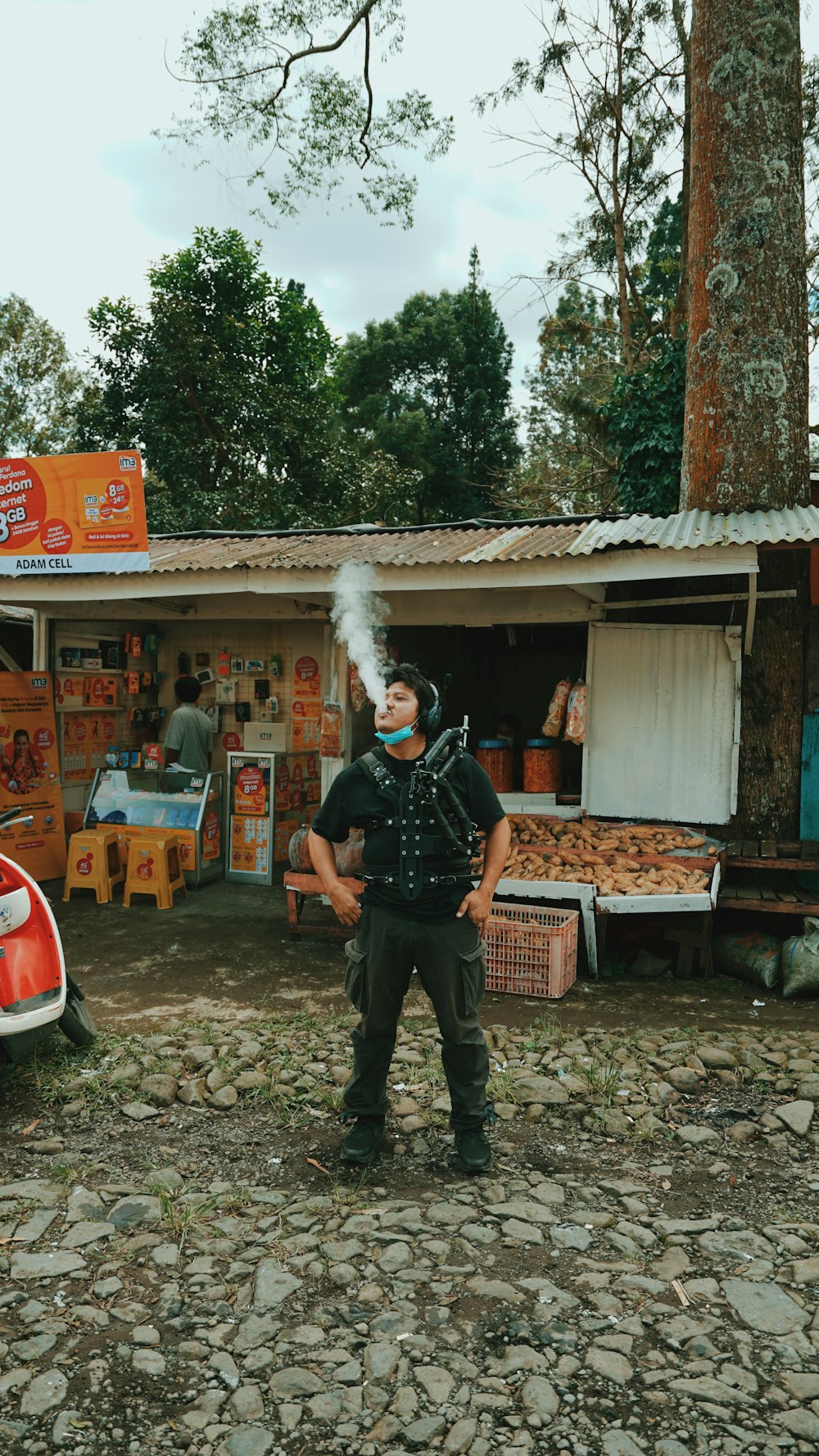 man in black jacket smoking