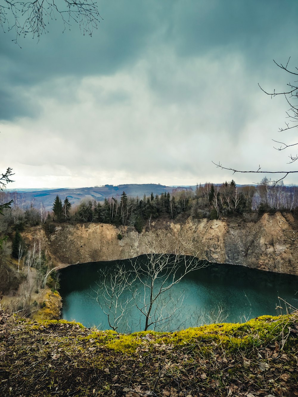 brown and green mountain under white clouds