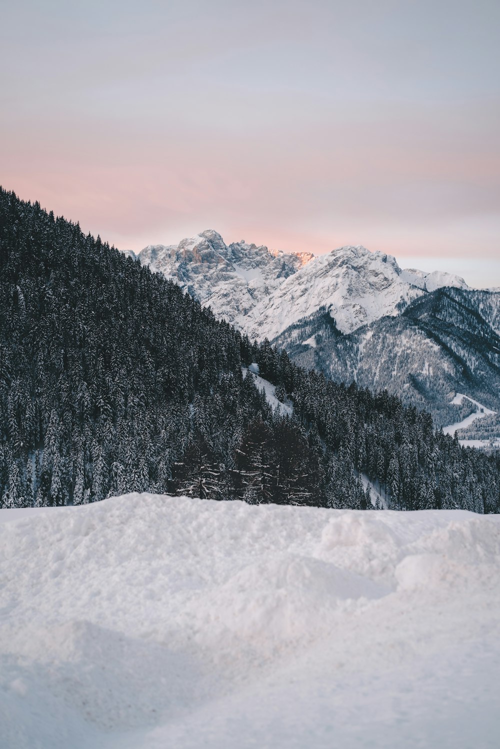 snow covered mountain during daytime