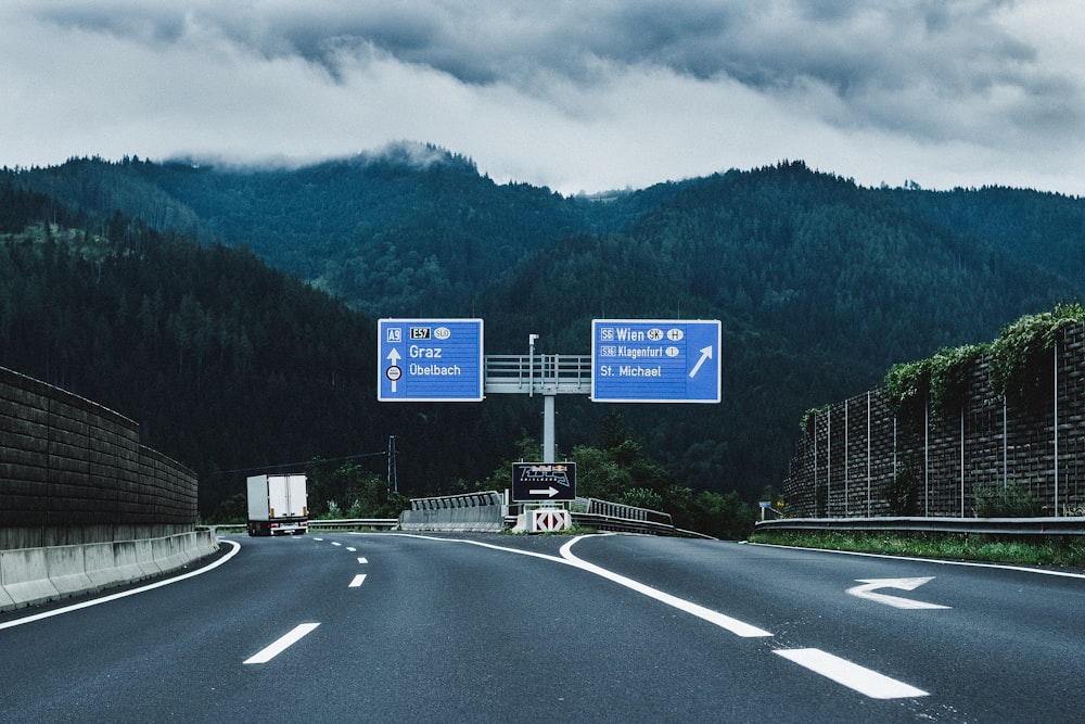 blue and white road sign