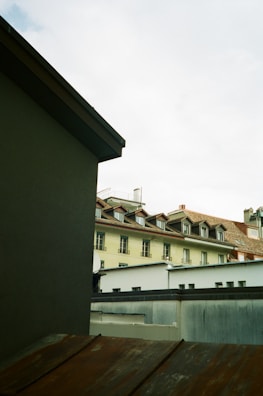 A panoramic view of Bangor rooftops showcasing various roofing styles and colors.